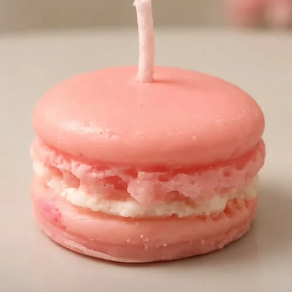 Pink macaron soy candle with a creamy filling layer